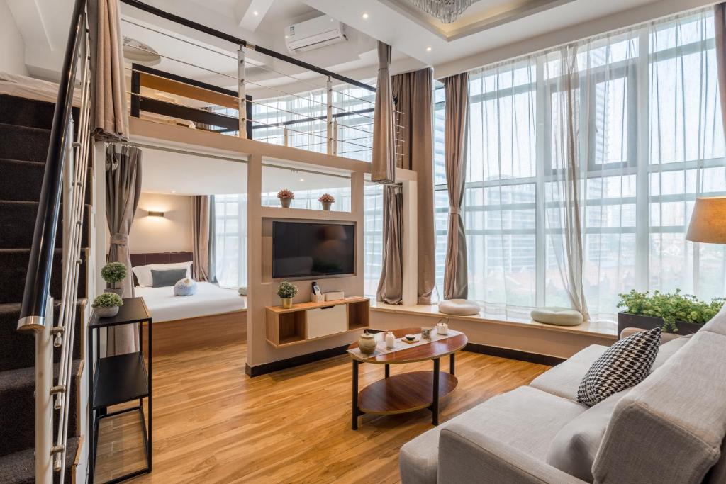 Postel nebo postele na pokoji v ubytování Shanghai Meego Qingwen Hotel