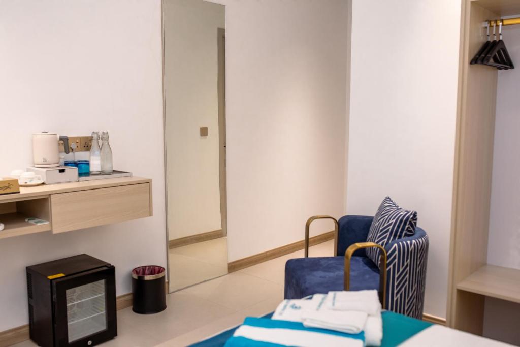 Postel nebo postele na pokoji v ubytování Aqua Heaven Inn