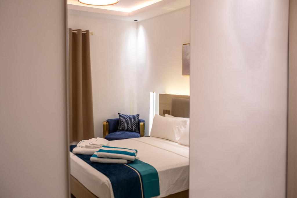 Postel nebo postele na pokoji v ubytování Aqua Heaven Inn