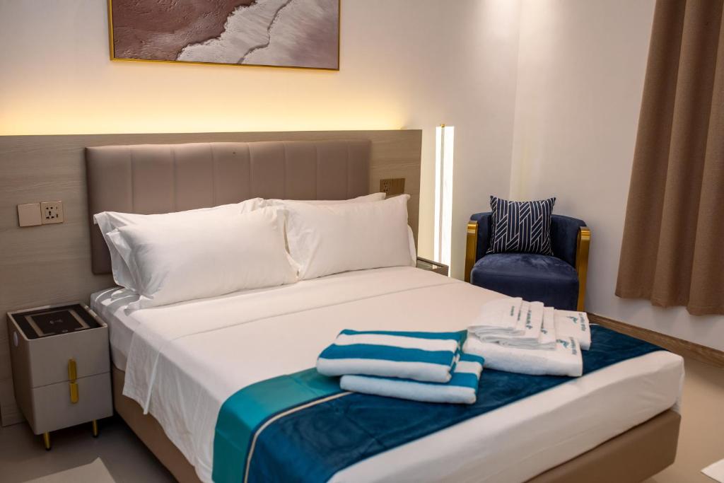 Postel nebo postele na pokoji v ubytování Aqua Heaven Inn