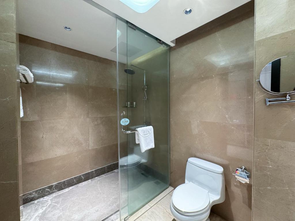 Koupelna v ubytování Dongguan Kai Benli International Hotel