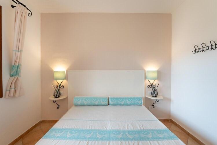 Postel nebo postele na pokoji v ubytování Apartments with shared pool Vignola Mare Aglientu
