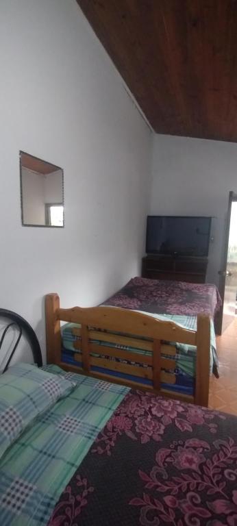 Postel nebo postele na pokoji v ubytování Hospedaje Solianka