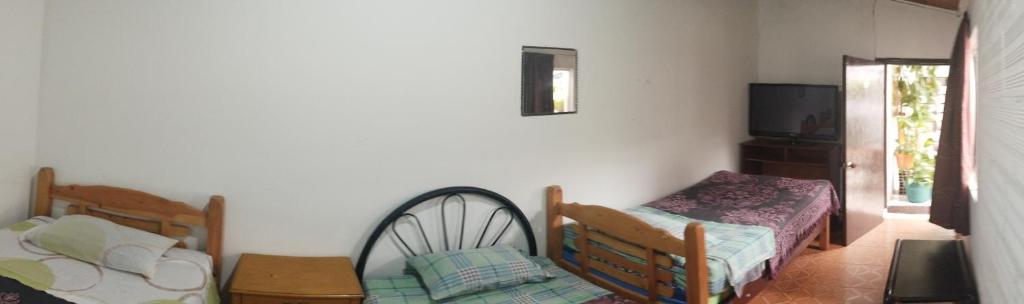 Postel nebo postele na pokoji v ubytování Hospedaje Solianka