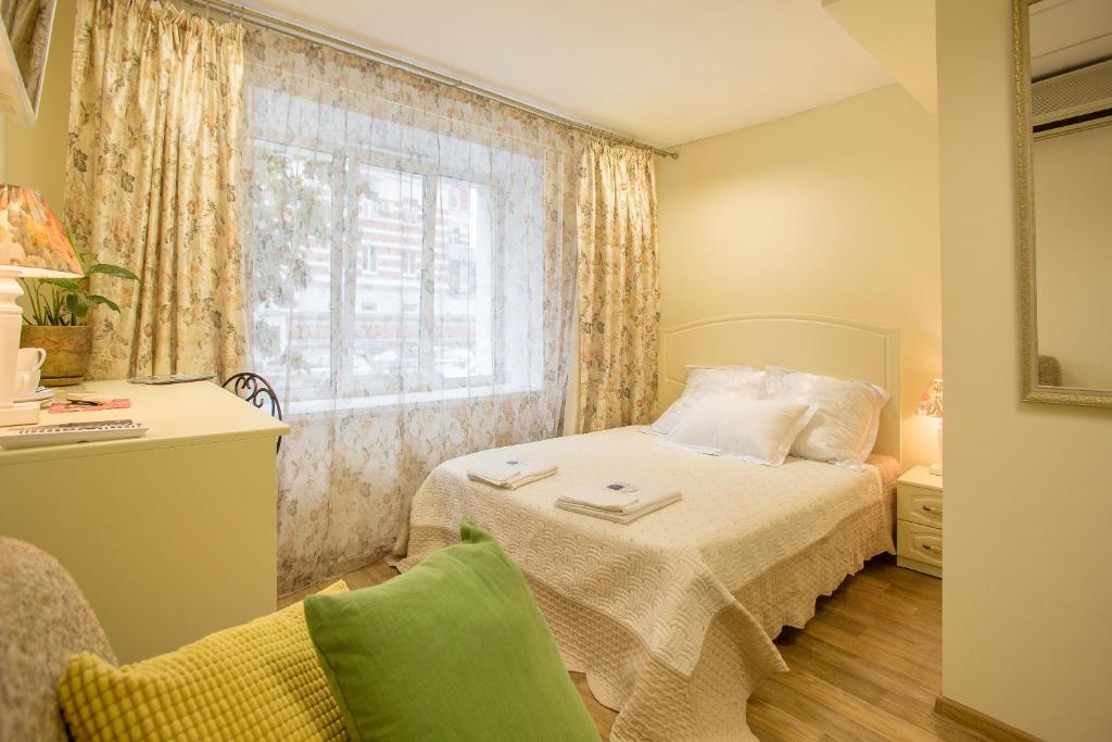 Кровать или кровати в номере Мини-Отель Albergo