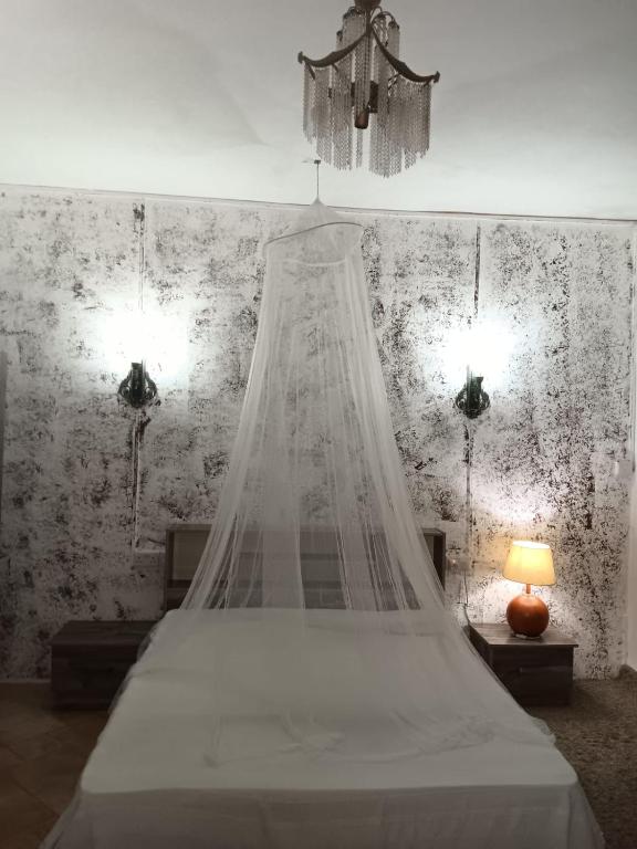Postel nebo postele na pokoji v ubytování Studio Le Palmiste