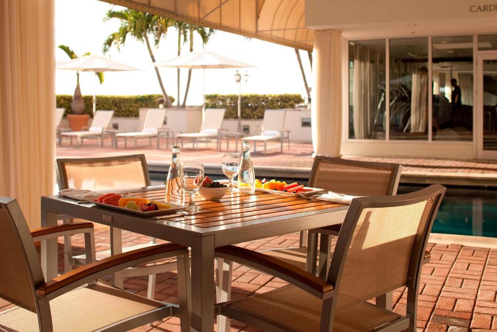 a table with a tray of food on a patio at Miami Marriott Dadeland in Miami