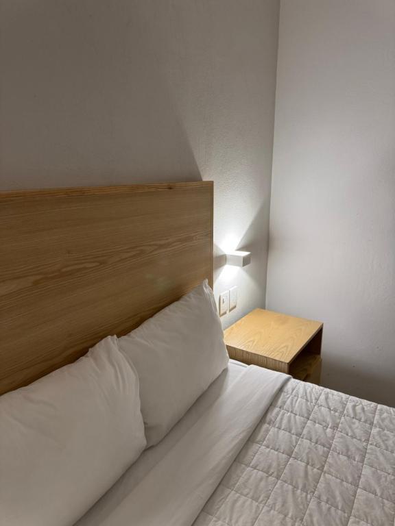 Postel nebo postele na pokoji v ubytování Hotel Posada Real
