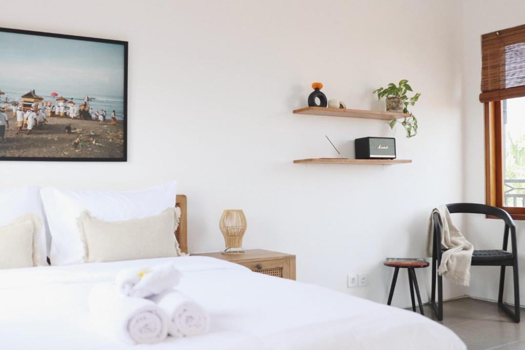 Ένα ή περισσότερα κρεβάτια σε δωμάτιο στο Pomelo Travel Outpost Bali
