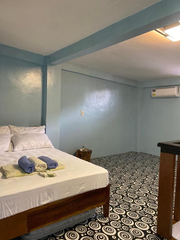 Postel nebo postele na pokoji v ubytování Paradiso Hostel Extension