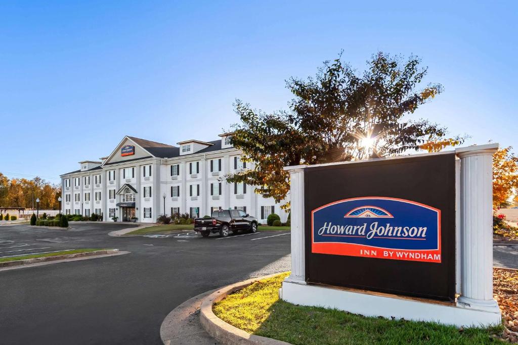 a sign for a banquet hall in front of a building at Howard Johnson by Wyndham Jackson in Jackson