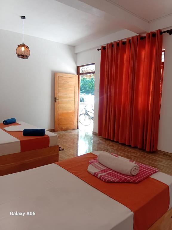 Postel nebo postele na pokoji v ubytování Sigiriya Elegant Resort