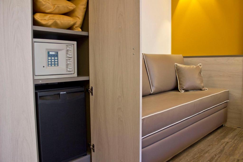 Postel nebo postele na pokoji v ubytování Hotel Dolomiti