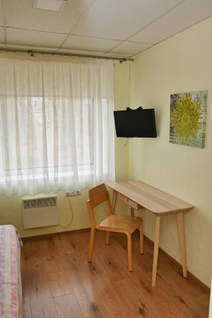 TV a/nebo společenská místnost v ubytování Vinni Hostel