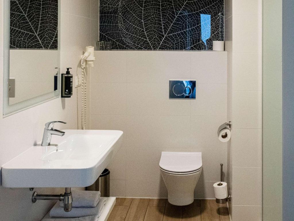 Koupelna v ubytování ibis Styles Bialystok