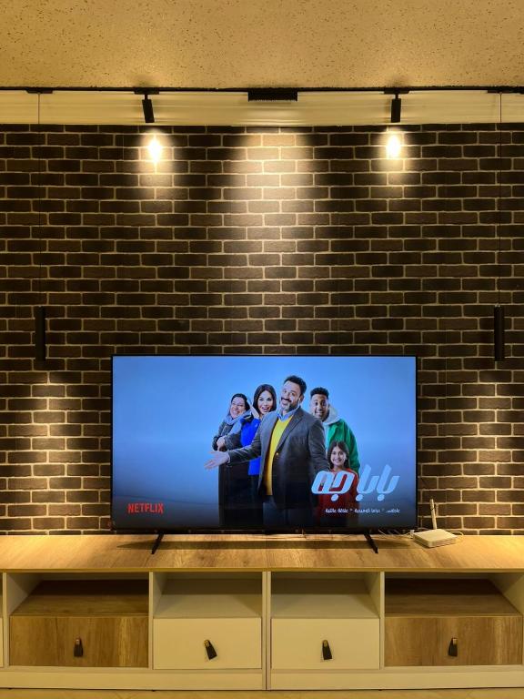 TV a/nebo společenská místnost v ubytování دار مصر الشيخ زايد