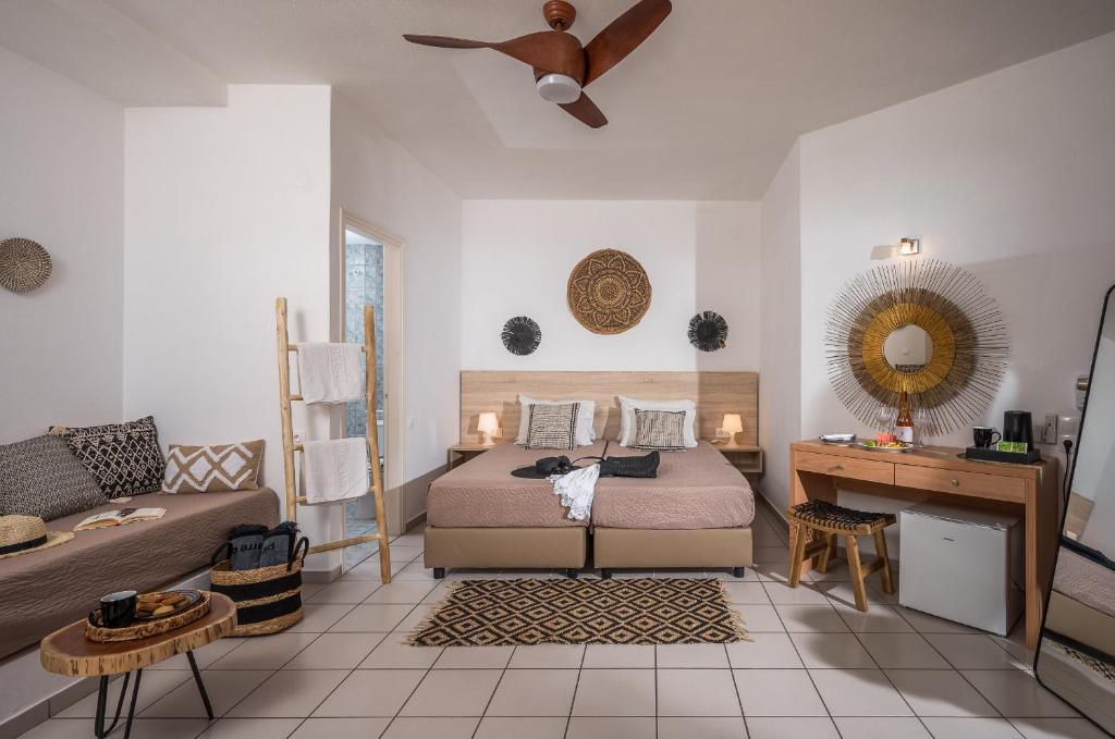 Postel nebo postele na pokoji v ubytování Cretan Seaside Boutique Hotel - Adults Only