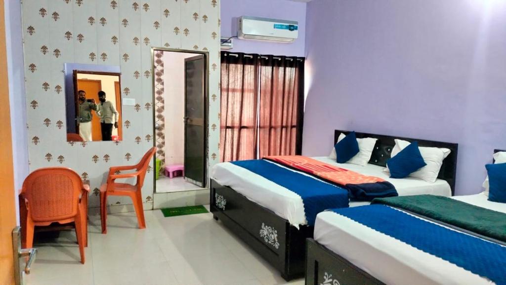 Voodi või voodid majutusasutuse Premshi Guest House toas