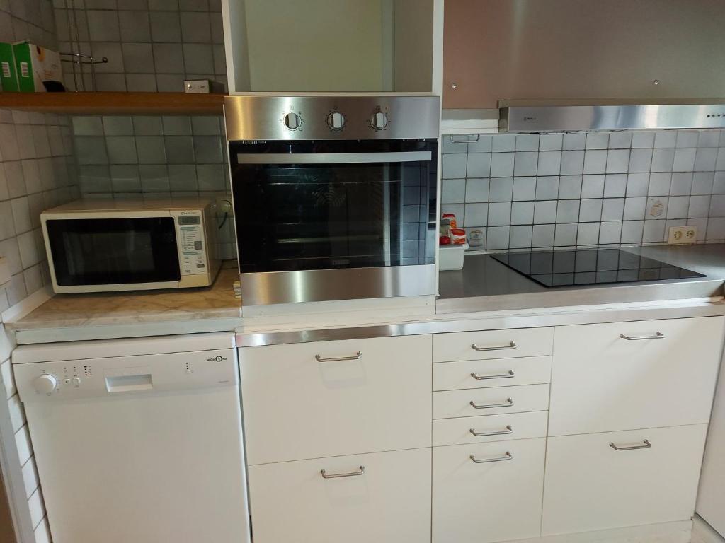 Kuchyň nebo kuchyňský kout v ubytování Gîte du sanglier