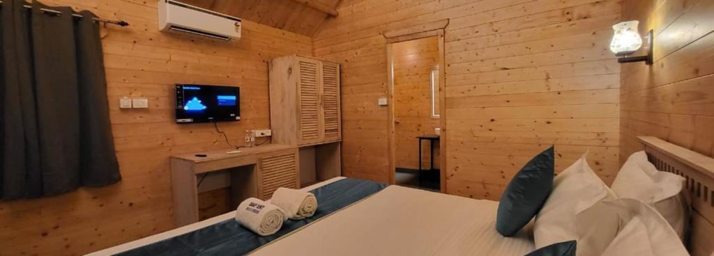 Postel nebo postele na pokoji v ubytování Sand Tent Beach Resort Patnem