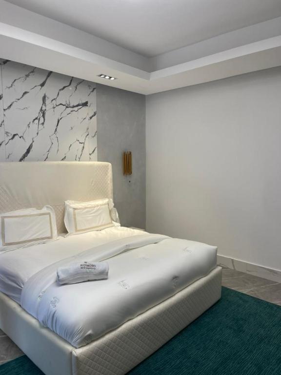 Postel nebo postele na pokoji v ubytování Sujimoto Residences MacDonald