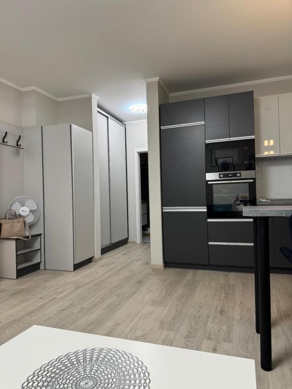 Kuchyň nebo kuchyňský kout v ubytování Komarom Luxe Apartment