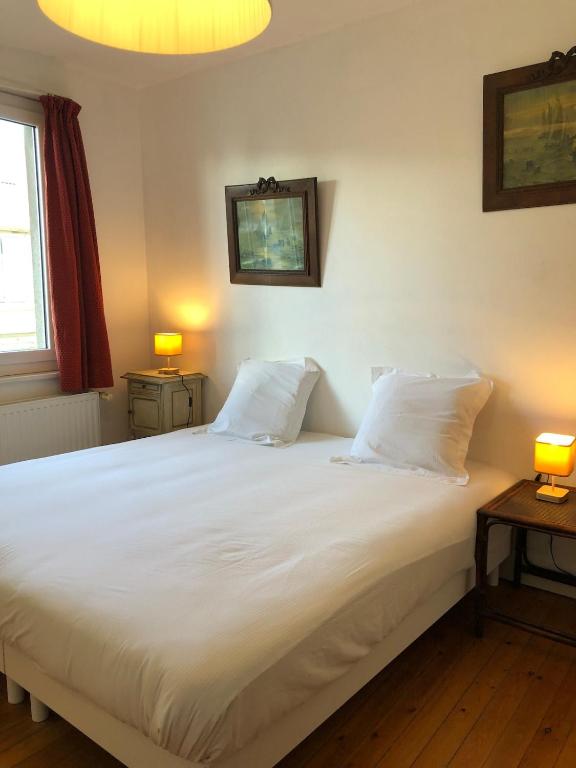 Postel nebo postele na pokoji v ubytování Villa Triton - Vue mer