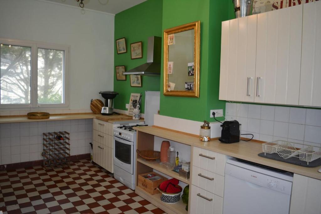 Kuchyň nebo kuchyňský kout v ubytování Villa Triton - Vue mer