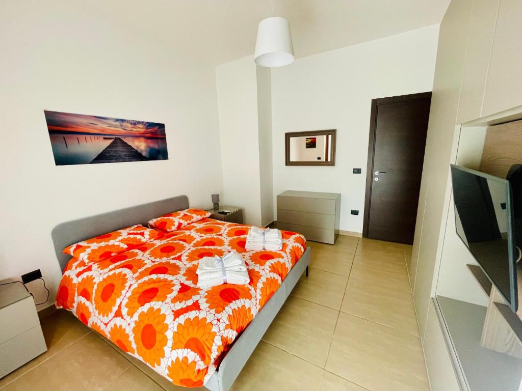 Ένα ή περισσότερα κρεβάτια σε δωμάτιο στο Casa Adele