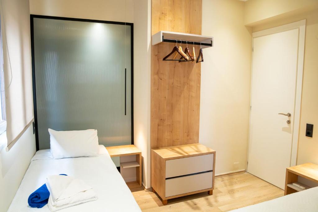 Postel nebo postele na pokoji v ubytování Akira Villa