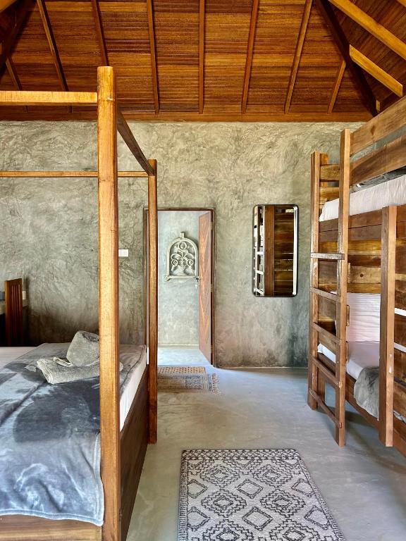 Postel nebo postele na pokoji v ubytování Arasi Resort