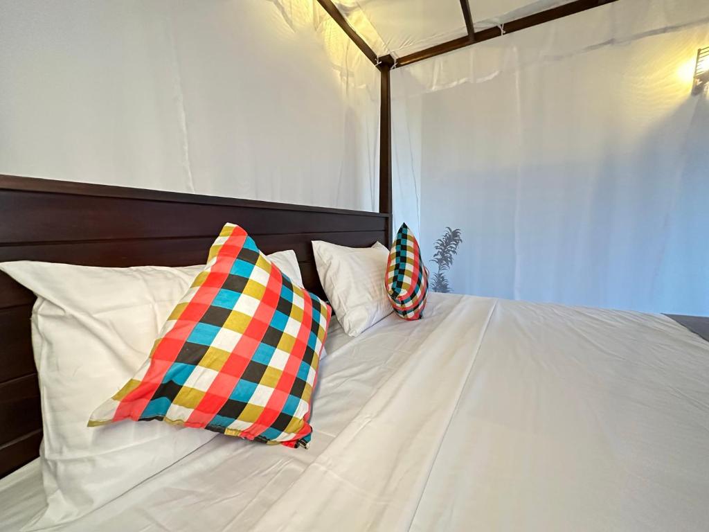 Ένα ή περισσότερα κρεβάτια σε δωμάτιο στο Sunliya Resort
