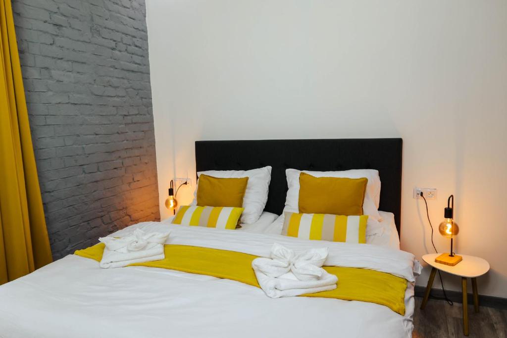 Postel nebo postele na pokoji v ubytování Spring Apartments Karlovy Vary