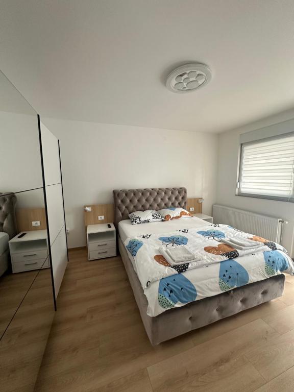 Postel nebo postele na pokoji v ubytování Apartman Aranđelovac