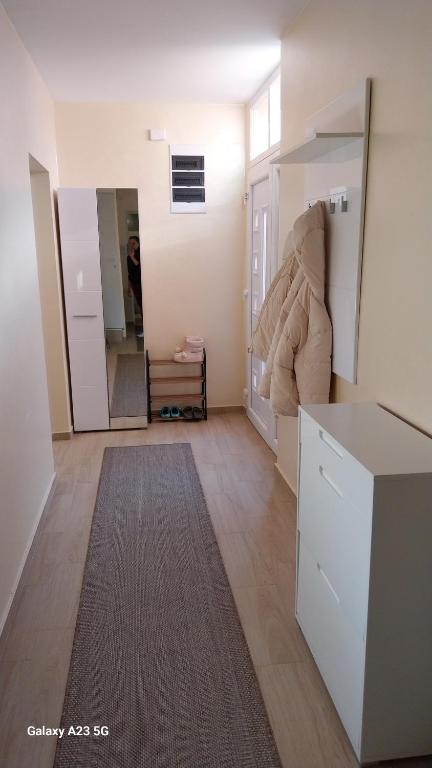 Postel nebo postele na pokoji v ubytování Apartman Mina