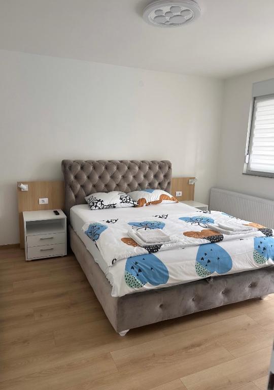 Postel nebo postele na pokoji v ubytování Apartman Aranđelovac