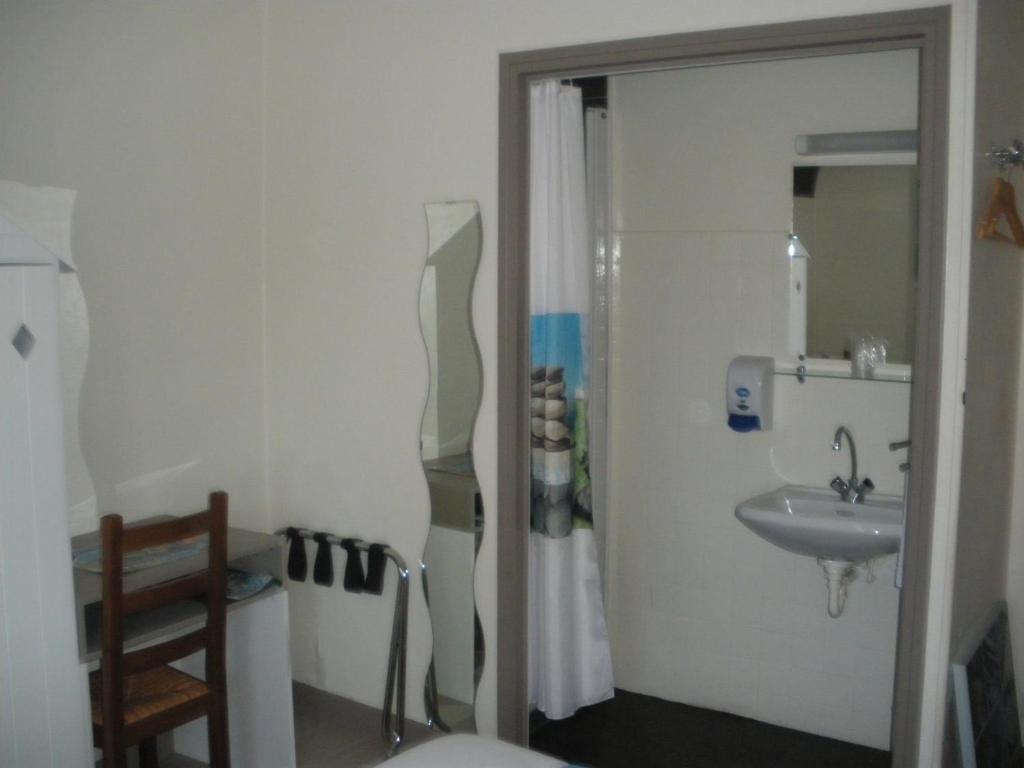 Koupelna v ubytování Hotel Du Port