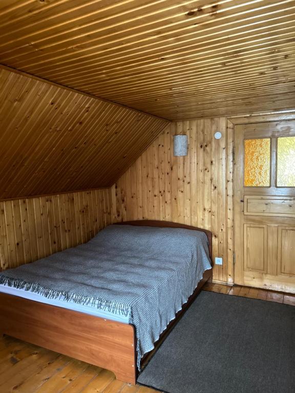 Postel nebo postele na pokoji v ubytování Guest House Kaspiy