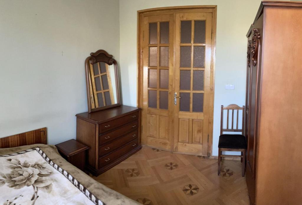Postel nebo postele na pokoji v ubytování GuestHouse Sagarejo