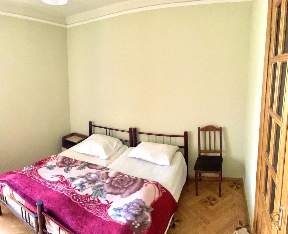 Postel nebo postele na pokoji v ubytování GuestHouse Sagarejo