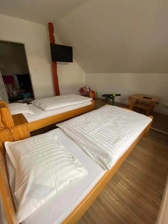 Postel nebo postele na pokoji v ubytování Domek blisko Jeziora na Mazurach u Zofijki