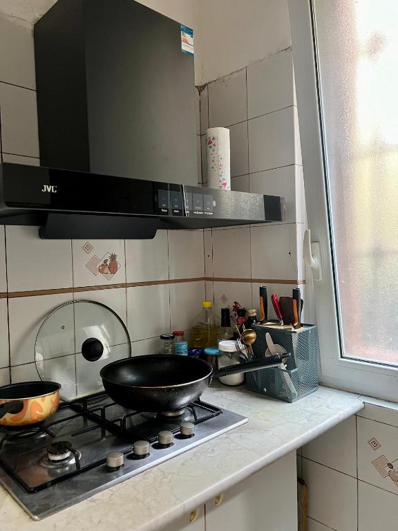Kuchyň nebo kuchyňský kout v ubytování Muse Inn