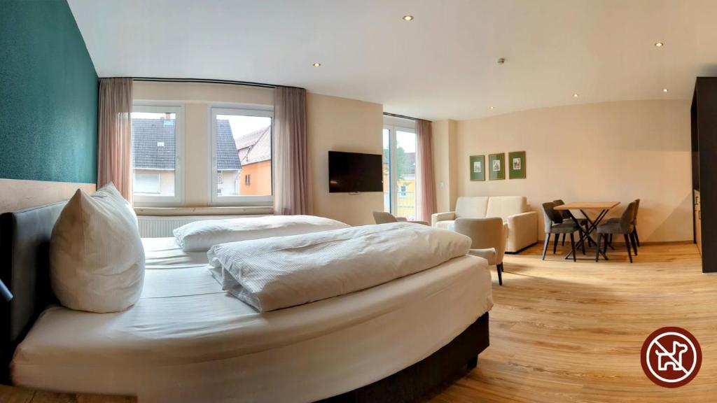Postel nebo postele na pokoji v ubytování Hotel Brauerei Gasthof Höhn