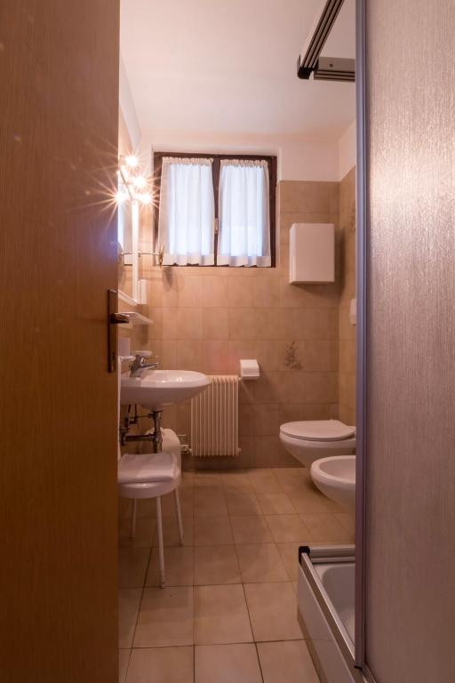 Koupelna v ubytování Hotel Ferrari
