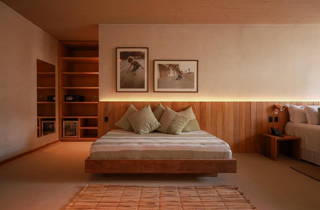 Cama ou camas em um quarto em Barracuda Boutique
