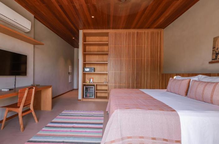 Cama ou camas em um quarto em Barracuda Boutique