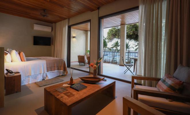Cama ou camas em um quarto em Barracuda Boutique