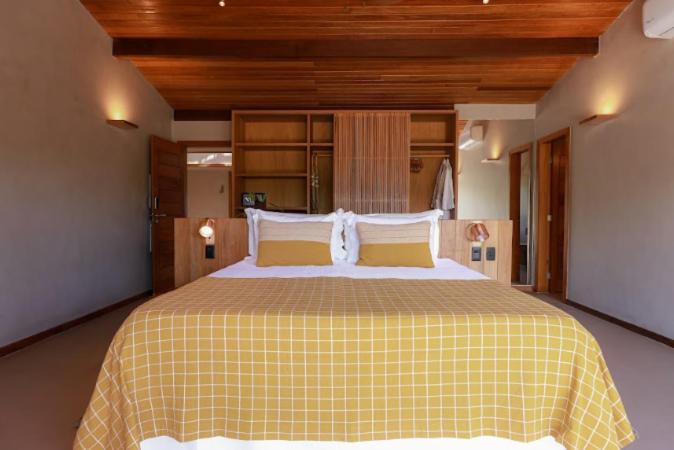 Cama ou camas em um quarto em Barracuda Boutique