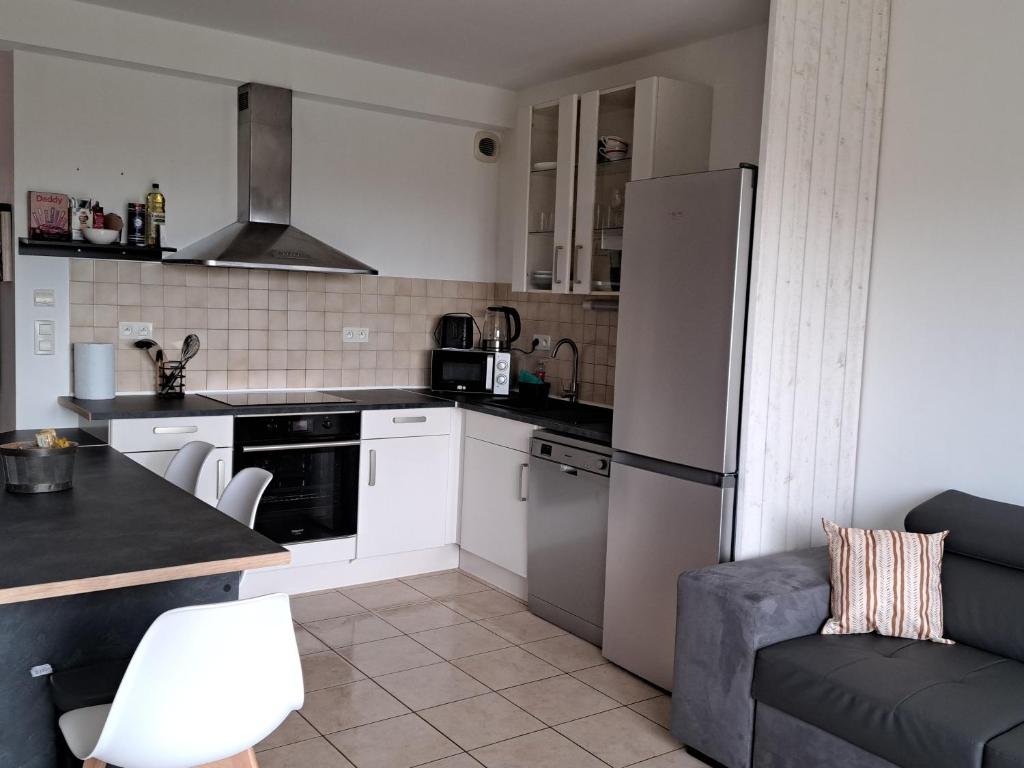 Kuchyň nebo kuchyňský kout v ubytování Cottage La Chaumière