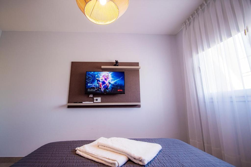 Postel nebo postele na pokoji v ubytování Río Cuarto Host